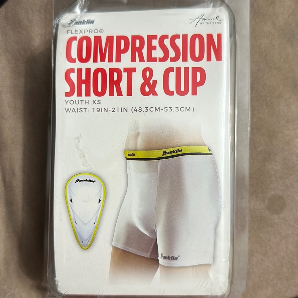 Compression shorts and cup